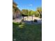 Gated driveway showing home's entrance, yard and mature landscaping at 11691 Diamond Pointe Ct, Indianapolis, IN 46236