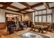 Inviting living room showcasing hardwood floors, large windows, and comfortable seating, perfect for relaxation at 11691 Diamond Pointe Ct, Indianapolis, IN 46236