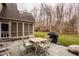 Outdoor patio featuring a dining set and grill, perfect for entertaining and outdoor dining at 11691 Diamond Pointe Ct, Indianapolis, IN 46236