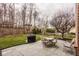 Outdoor patio with dining set overlooking a large yard, perfect for outdoor entertaining at 11691 Diamond Pointe Ct, Indianapolis, IN 46236