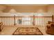 Second floor landing with plush carpet, decorative rug and a view to the entry below at 11691 Diamond Pointe Ct, Indianapolis, IN 46236