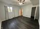 Well-lit bedroom features new flooring, and access to a connected bath and closet at 1258 Soaring Eagle Dr, Greenwood, IN 46143