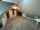 Finished bonus room features carpet, light, and a versatile layout at 1258 Soaring Eagle Dr, Greenwood, IN 46143