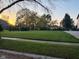 A vibrant green lawn in front of a home at dusk at 1258 Soaring Eagle Dr, Greenwood, IN 46143