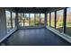 Sunroom filled with natural light, tiled floor and stunning views of the outdoors at 1258 Soaring Eagle Dr, Greenwood, IN 46143