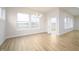 Bright dining room features hardwood floors, recessed lighting and large windows at 15810 Vitalize Run, Fishers, IN 46040