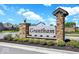 Grantham neighborhood entrance sign with stone pillars and lush landscaping at 15810 Vitalize Run, Fishers, IN 46040