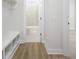 Hallway features a storage bench and view into the bathroom at 15810 Vitalize Run, Fishers, IN 46040