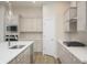 Stylish kitchen with stainless steel appliances, gas cooktop, and quartz countertops at 15810 Vitalize Run, Fishers, IN 46040