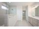 Elegant main bathroom featuring a glass-enclosed shower, and a double sink vanity at 15810 Vitalize Run, Fishers, IN 46040