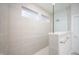 Modern bathroom shower with glass surround, tile surround and chrome hardware at 15810 Vitalize Run, Fishers, IN 46040