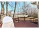A backyard deck with wooden railings and a grill, perfect for outdoor entertaining at 1728 Timber Heights Dr, Carmel, IN 46280