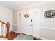 Bright and welcoming foyer with a decorative front door and traditional accents at 1728 Timber Heights Dr, Carmel, IN 46280
