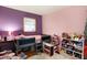 Bright bedroom featuring a cozy loft bed and playful decor at 230 N School St, Fortville, IN 46040