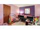 Cheerful bedroom with rainbow wall art and loft bed at 230 N School St, Fortville, IN 46040