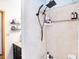 Updated shower with rainfall shower head and convenient shelving at 230 N School St, Fortville, IN 46040