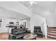 Bright open-concept living room and kitchen with hardwood floors and stainless steel appliances at 251 Hendricks Pl, Indianapolis, IN 46201