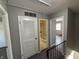 Upstairs hallway with neutral paint, leading to the bathroom and bedrooms at 2826 Country Estates Dr, Indianapolis, IN 46227