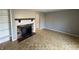 Spacious living room featuring a fireplace, neutral paint, and wood-like floors at 2826 Country Estates Dr, Indianapolis, IN 46227