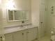 Bathroom features white vanity with mirror and lighting at 3300 Heritage Rd, Columbus, IN 47203