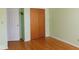 Bedroom with a closet and wood floors at 3300 Heritage Rd, Columbus, IN 47203