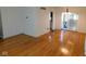 Spacious dining room featuring hardwood floors, fresh paint and natural light at 3300 Heritage Rd, Columbus, IN 47203