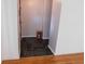 Inviting foyer with slate tile flooring, fresh paint, and natural light at 3300 Heritage Rd, Columbus, IN 47203