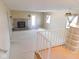 Cozy living room with brick fireplace and lots of natural light at 3300 Heritage Rd, Columbus, IN 47203