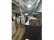Utility basement with laundry hookups including a washer, dryer, and storage at 340 N Eaton Ave, Indianapolis, IN 46219
