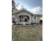Charming covered front porch with seating and tasteful decor, creating a welcoming entrance at 340 N Eaton Ave, Indianapolis, IN 46219