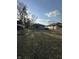 Modest single Gathering home featuring charming covered porch and front yard at 340 N Eaton Ave, Indianapolis, IN 46219