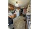 Functional kitchen with wood cabinets, white appliances, and standard features, ready for a refresh at 340 N Eaton Ave, Indianapolis, IN 46219
