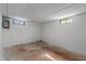 Unfinished basement with paneled walls and small windows at 3505 Ralston Ave, Indianapolis, IN 46218