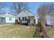 Cozy single-Gathering home with brick and siding, complemented by a green lawn at 3505 Ralston Ave, Indianapolis, IN 46218