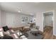 Well-decorated living room with hardwood floors, modern furniture and an open layout at 3505 Ralston Ave, Indianapolis, IN 46218