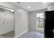 Kitchen and entry area featuring decorative tiled floors and modern appliances at 3534 Fredricksburg Dr, Indianapolis, IN 46227