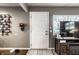 Inviting entryway with a view of a television and front yard window to give a welcoming view at 3867 Asbury St, Indianapolis, IN 46227