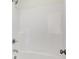 Bright bathroom shower with tub featuring white fixtures and chrome hardware at 3923 Wren Dr, Brownsburg, IN 46112