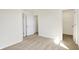 Spacious bedroom featuring plush carpeting, multiple closets, and bright natural lighting at 3923 Wren Dr, Brownsburg, IN 46112