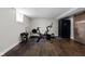 Finished basement gym with sleek exercise bike and modern flooring at 4707 N Park Ave, Indianapolis, IN 46205