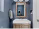 Charming bathroom with a mirror, towel rack, and vanity at 4707 N Park Ave, Indianapolis, IN 46205