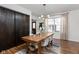 Bright dining room with a wooden table, stylish chandelier, and modern decor at 4707 N Park Ave, Indianapolis, IN 46205