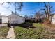 Backyard with detached one car garage and grassy lawn at 4929 Young Ave, Indianapolis, IN 46201