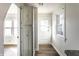 Hallway features built-in storage cabinets, wood floors, and natural lighting at 4929 Young Ave, Indianapolis, IN 46201