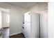 Bright kitchen with white appliances, modern countertops, and hardwood flooring at 4929 Young Ave, Indianapolis, IN 46201