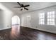 Inviting living room featuring new floors, neutral walls, and large windows with plenty of light at 4929 Young Ave, Indianapolis, IN 46201