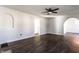 Bright living room featuring neutral paint, stylish floors, and a modern ceiling fan at 4929 Young Ave, Indianapolis, IN 46201