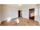 Bedroom features hardwood floors, trim, and dark-stained doors at 518 Central S Ct, Indianapolis, IN 46205
