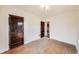 Bedroom featuring hardwood floors and stained paneled doors at 518 Central S Ct, Indianapolis, IN 46205
