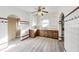 A functional kitchen featuring wood cabinets, vintage countertops, and white tile walls at 518 Central S Ct, Indianapolis, IN 46205